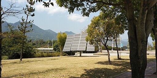 Photo of solar panels on the bank of the Xiyuan River in China by Davidzdh is licensed by CC BY-SA 4.0